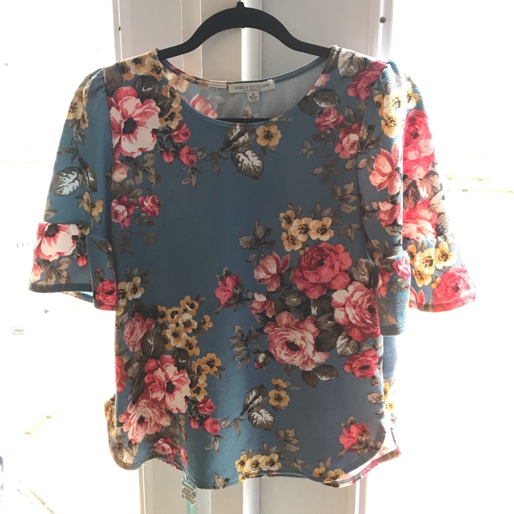 Floral with blue background Women’s top size M